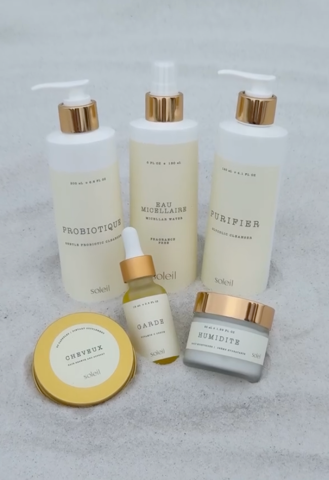 Soleil supplements, serum and moisturizer arranged together